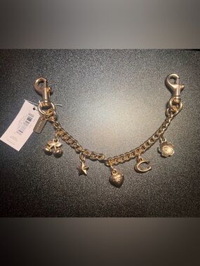 Coach Gold Charm Strap with Heart, Star, Cherry, and C Logo Charms